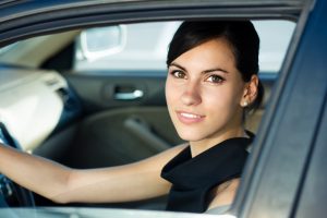 Woman in car. Title Loans Northridge