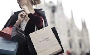 Woman with shopping bags. Title Loans Sherman Oaks