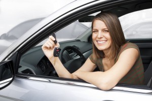 Girl in a car with keys. Auto Title Loans Round Rock